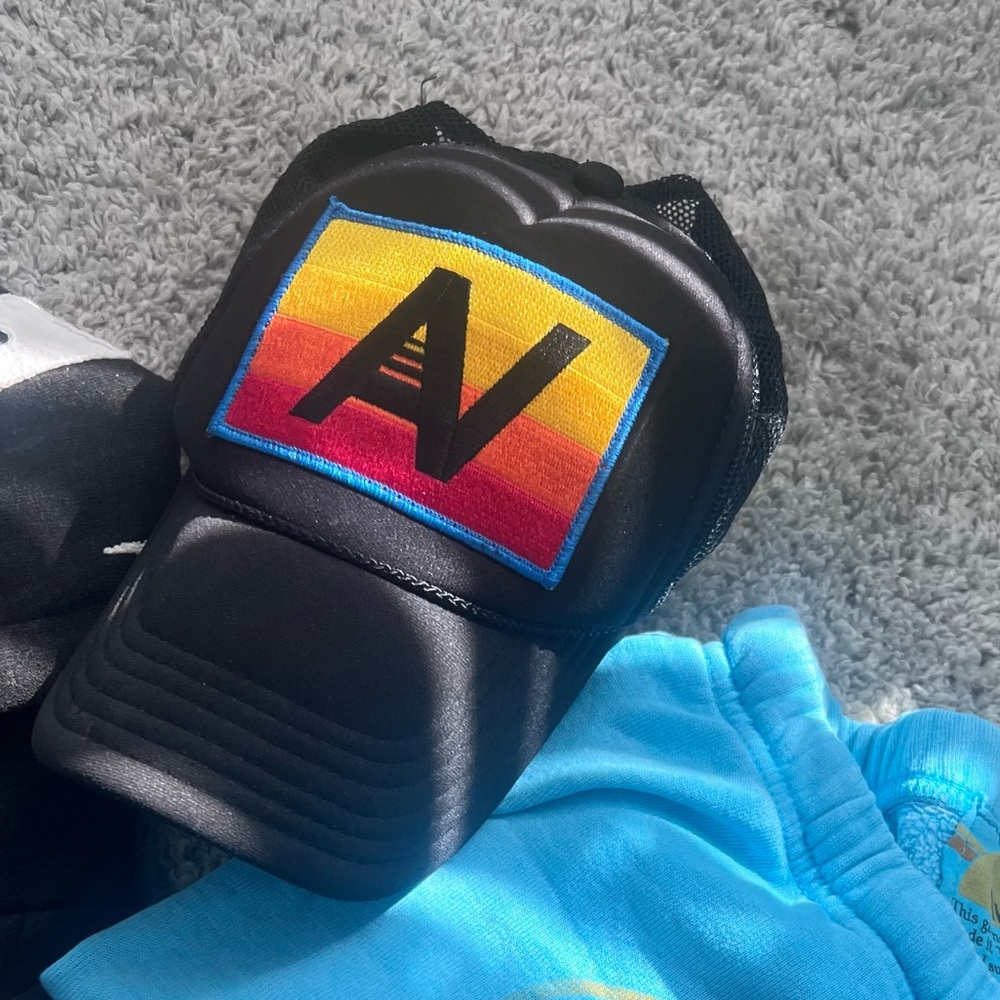 Aviator Nation Black Trucker Hat with Sunset Patch